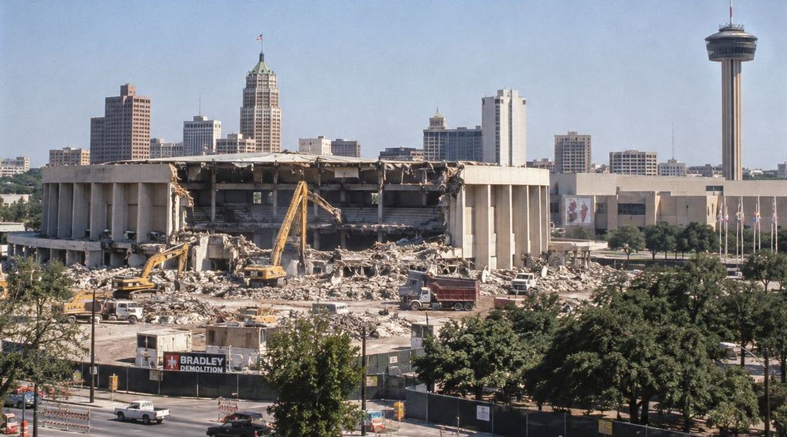 Illustrated reconstruction: HemisFair Arena half demolished, excavators and dump trucks in the rubble, the Tower of the Americas behind.